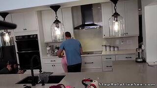 Dude fucks busty stepsister in the kitchen behind the scenes