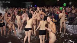 bare breasts bouncing beneath blurring city lights